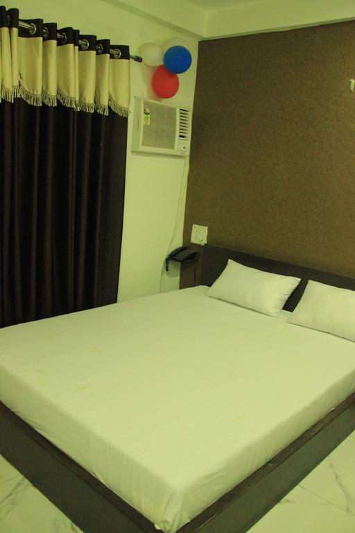 Hotel Divine Inn Varanasi Værelse billede